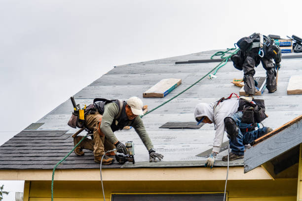 Professional Roofing technician working in Hunt, NY